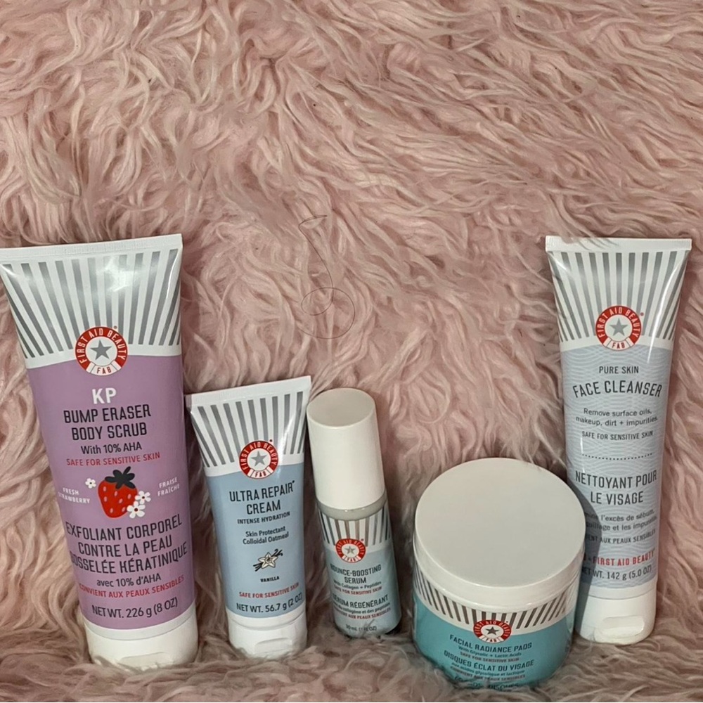 First Aid Beauty Skincare Collection with Red and Blue Packaging